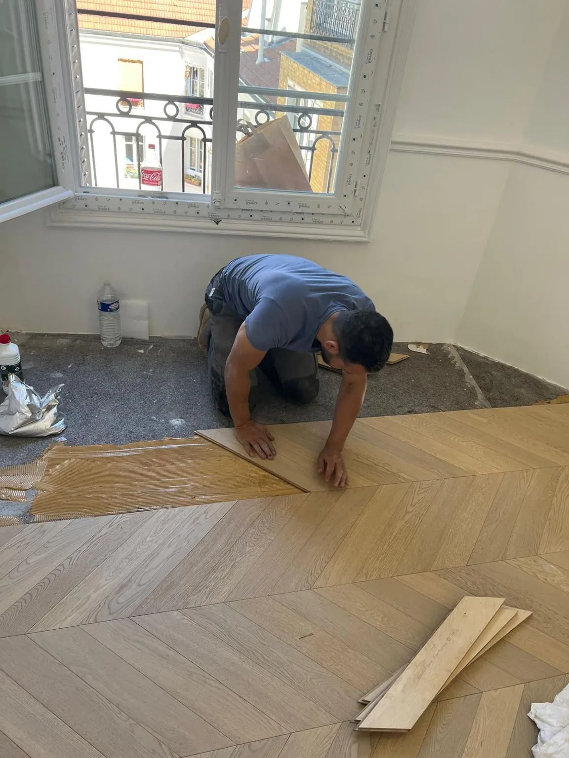 Séjour pendant les travaux : pose du parquet point de Hongrie